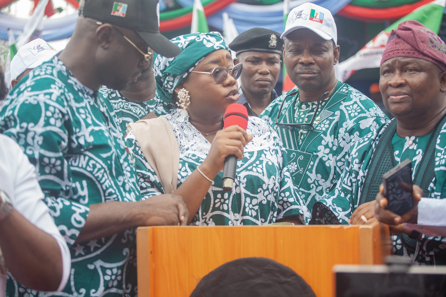A speaker addressing the CBM Ogun inauguration from a lectern