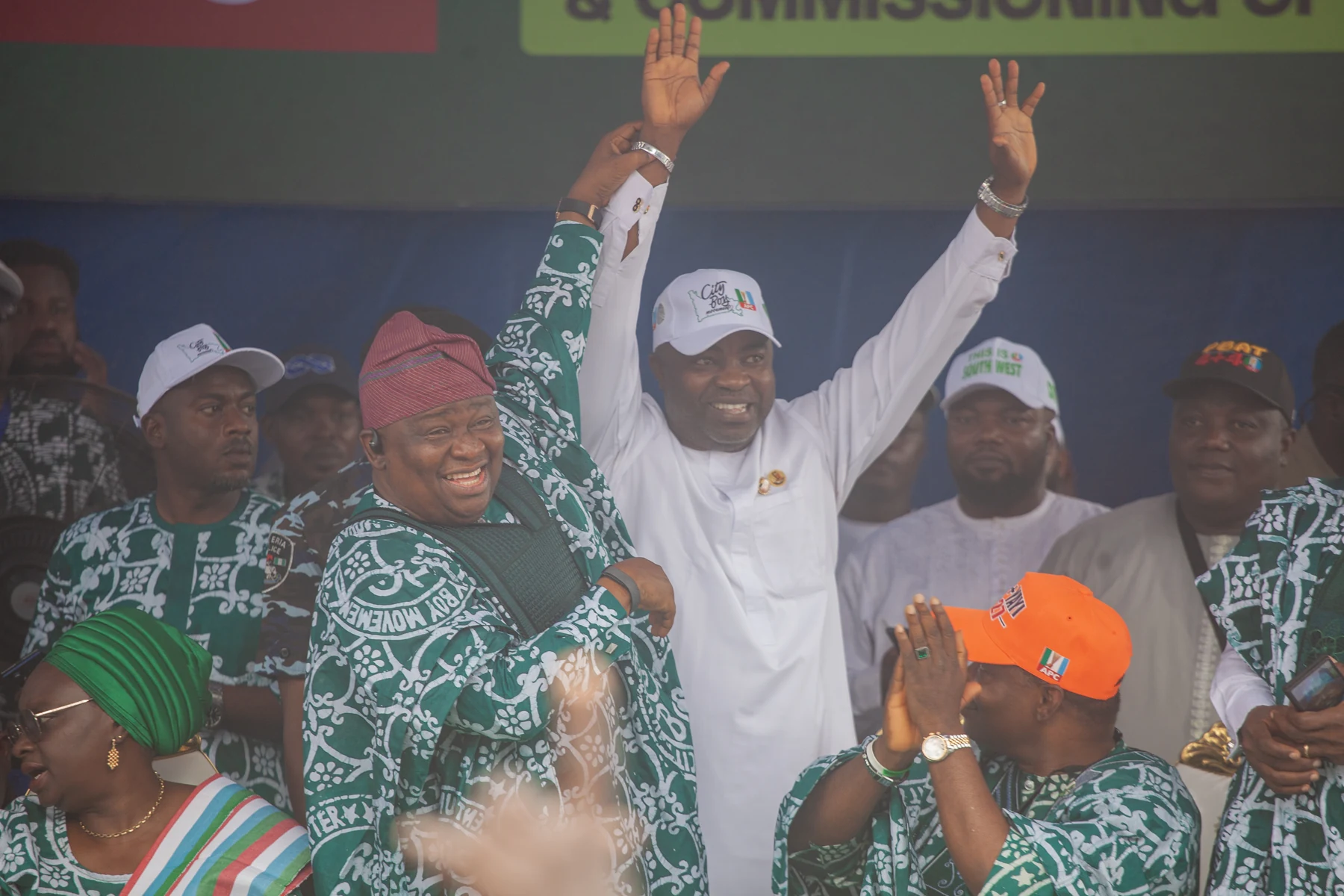 Participants raising their hands at the CBM Ogun inauguration