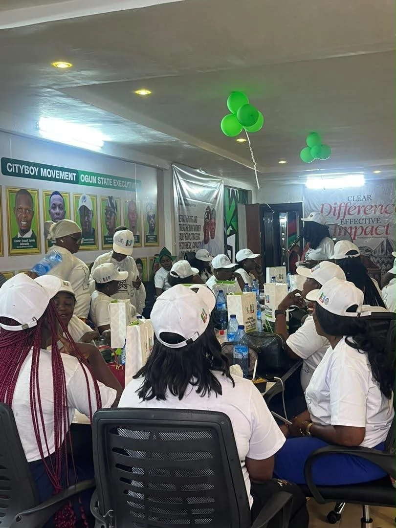 Women Wing attendees seated together inside the meeting venue
