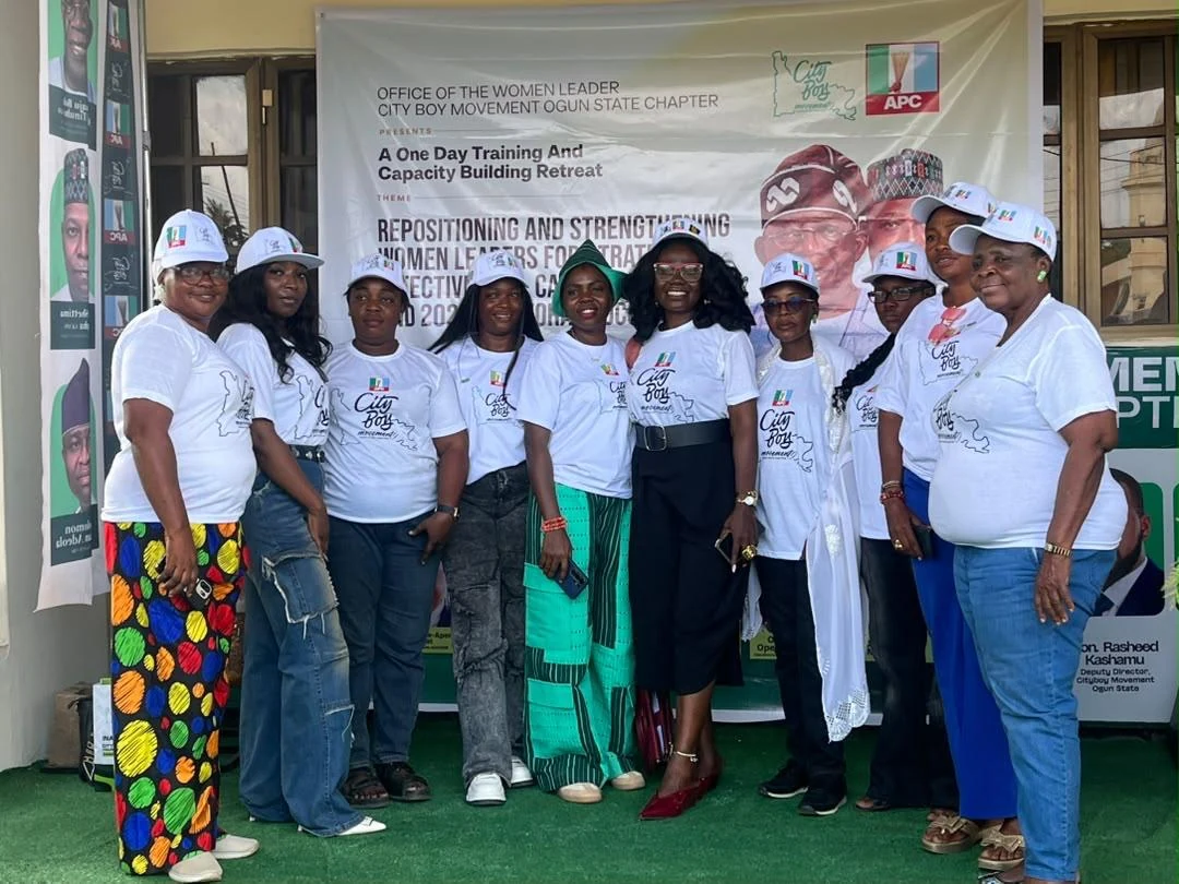 Women Wing members posing together outside the CBM Ogun office